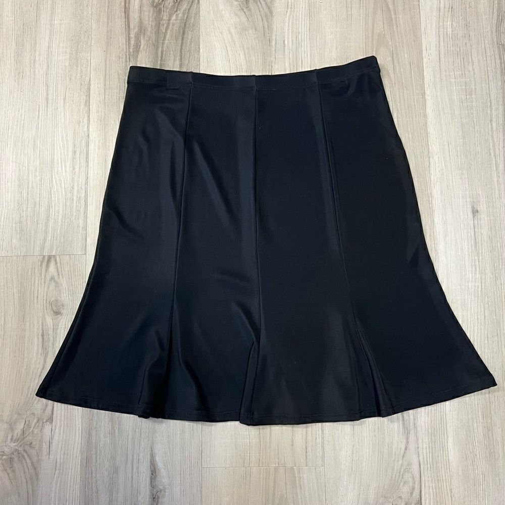 Vintage 90’s Carabella black tulip skirt. Never worn. Stretchy and sexy. Sz L